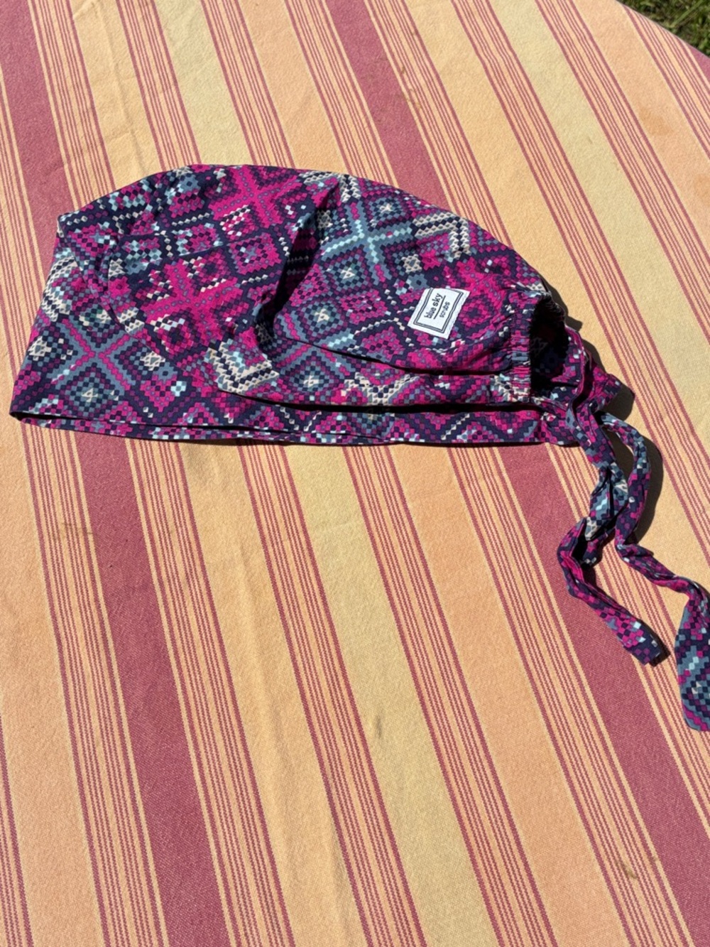 “Blue Sky Scrubs” Magenta & Blue Patterned Tie-Back scrub hat OS
